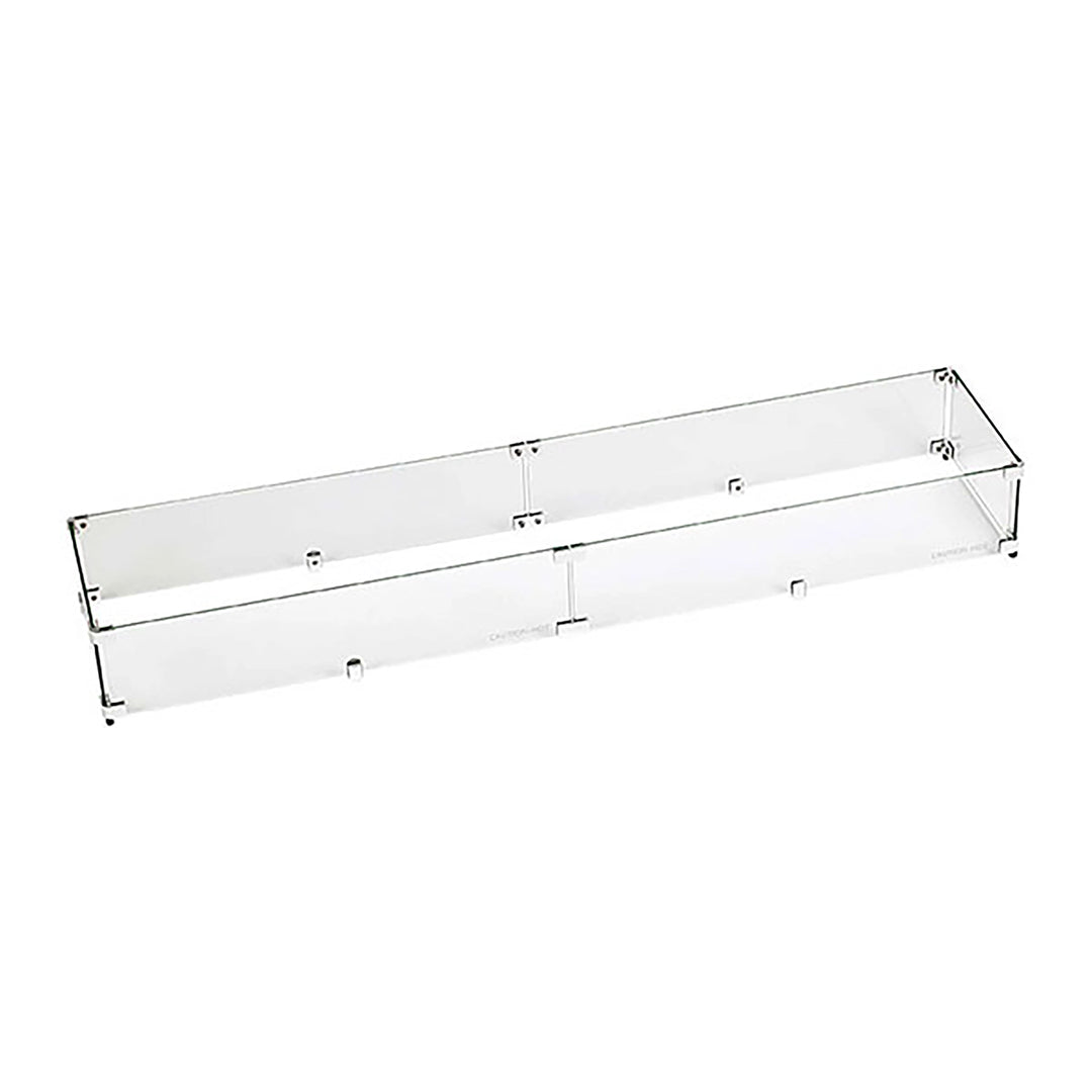 This 53.5" x 11.5" Linear Glass Flame Guard by American Fireglass is crafted from tempered glass for maximum durability and clarity. Ideal for large outdoor fire pits or fire tables, it minimizes wind disruption while offering an unobstructed view of the flames. The simple yet elegant design blends seamlessly into any modern outdoor space