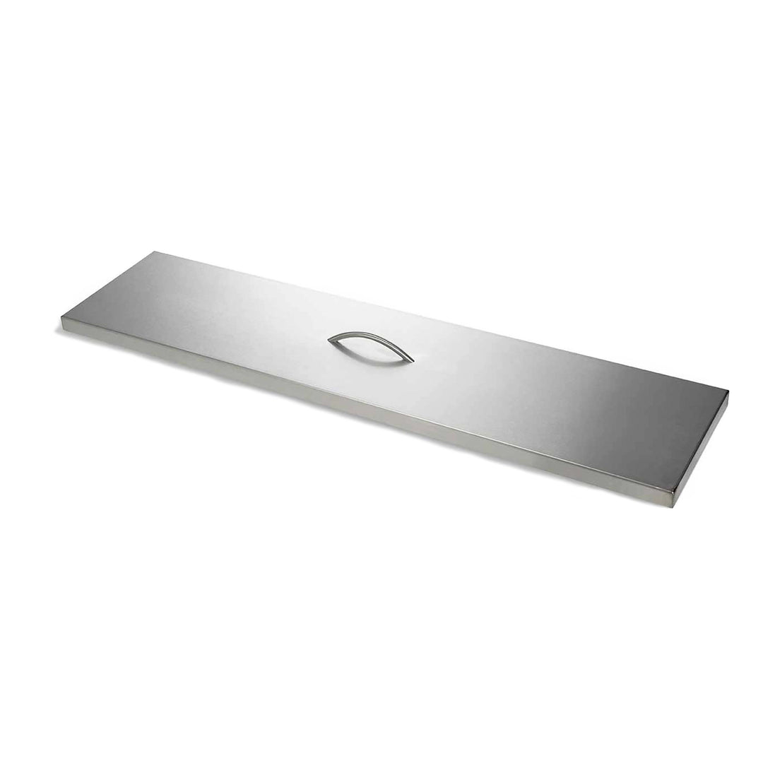 Linear Trough Stainless Steel Hard Fire Pit Burner Cover by HPC Fire, shown from a side angle. This rectangular burner cover features a sleek brushed stainless steel finish and a built-in handle for easy placement and removal. Designed for durability and protection, this cover shields the burner area from harsh weather, debris, and moisture, ensuring longevity for your outdoor fire pit setup. Ideal for both residential and commercial fire pit installations.