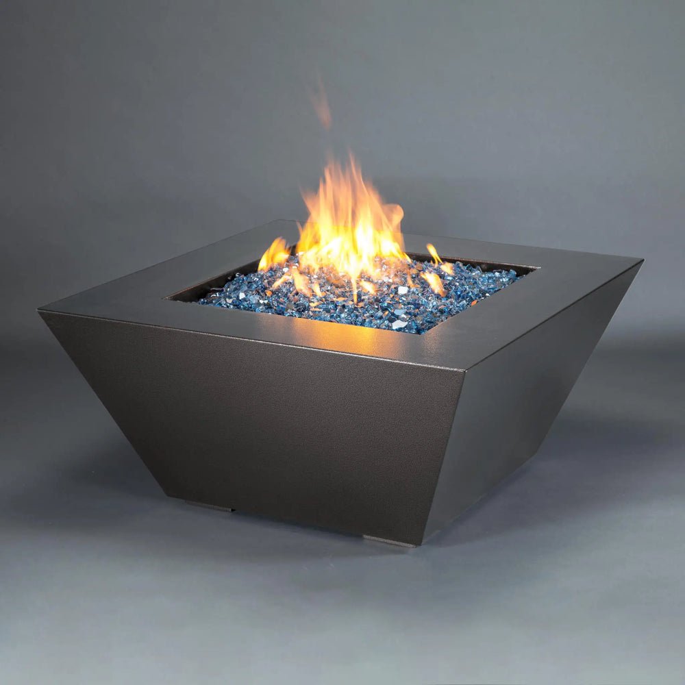 Mill 40-inch Square Steel Gas Fire Pit - Silver Hammertone, featuring a full view with a vibrant flame. A modern outdoor fire pit perfect for luxurious backyard spaces