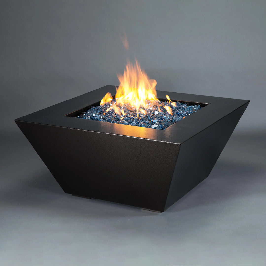 Angled view of the Mill 40-inch Square Steel Gas Fire Pit - Silver Vein, highlighting the sleek design and vibrant flames. Ideal for contemporary outdoor spaces