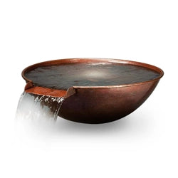 Bronze or copper-colored water bowl with a waterfall feature, showcasing water gently cascading over a spout, ideal for enhancing outdoor spaces with a serene ambiance