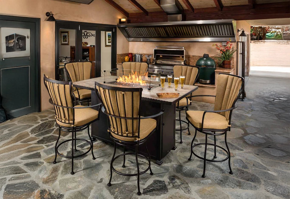 Cozy outdoor kitchen setting featuring a fire pit bar table with high-back cushioned bar stools, perfect for entertaining and dining al fresco