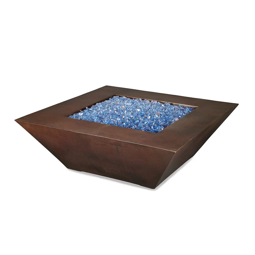 Square copper fire pit filled with blue fire glass, showcasing a contemporary design perfect for modern outdoor spaces