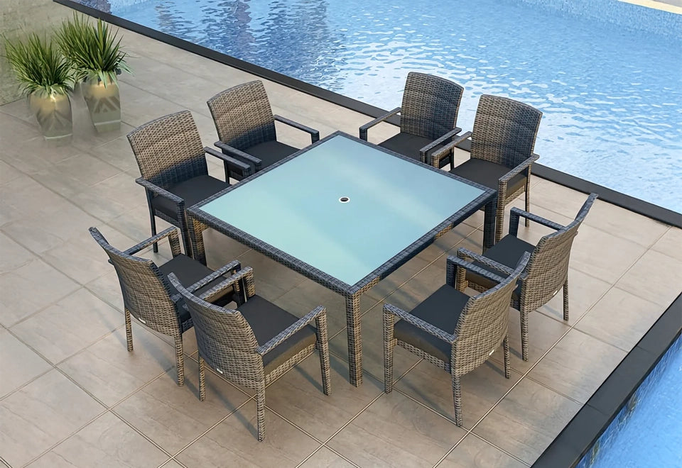 Elegant poolside wicker outdoor dining set featuring a square glass-top table and eight cushioned armchairs, perfect for patio gatherings.