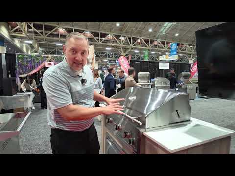 Video thumbnail of Chuck Nitschke presenting the Videl BBQ Commercial Grill at a trade show, showcasing a sleek stainless steel professional grill designed for high-performance outdoor cooking.