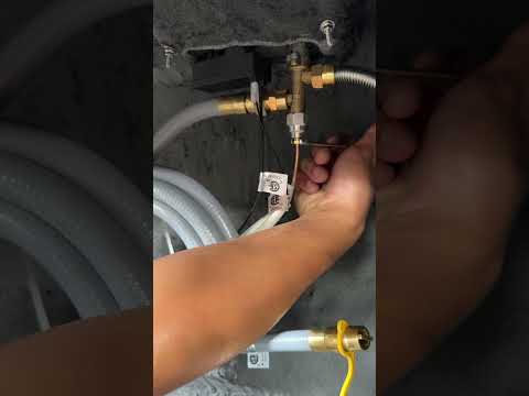 YouTube video thumbnail for the Starfire Designs Béton Fire Pit Propane to Natural Gas Conversion Kit installation guide, showing step-by-step instructions on how to safely convert your fire pit fuel source.