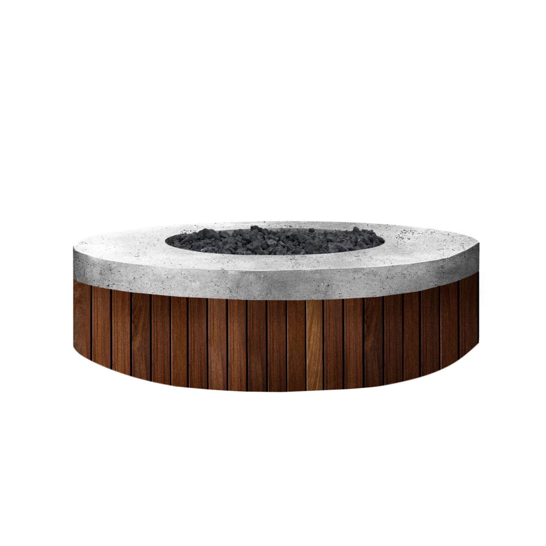 The Prism Hardscapes Hampton Fire Bowl in Pewter color, showcasing a round concrete fire bowl with contrasting wood slats, combines modern design with practical functionality for any outdoor living area. Perfect for luxury outdoor fire pit setups, this fire bowl provides a stylish and cozy centerpiece for outdoor gatherings, offering both aesthetic appeal and durable performance.