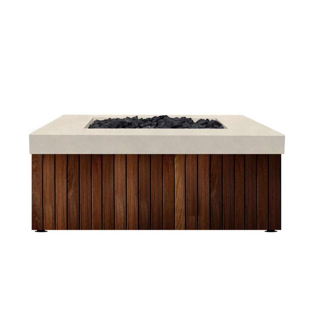 The Prism Hardscapes Manchester Fire Table in a soft coastal finish combines light concrete with warm wood accents, bringing a clean, breezy aesthetic to outdoor areas. The wood paneling at the base adds a touch of warmth, while the neutral concrete top contrasts for a modern yet inviting look. This fire table is perfect for those looking to create a beach-inspired fire pit setup, merging the practicality of an outdoor fire pit with a stylish, contemporary design for patio fire pits and backyard ambiance.