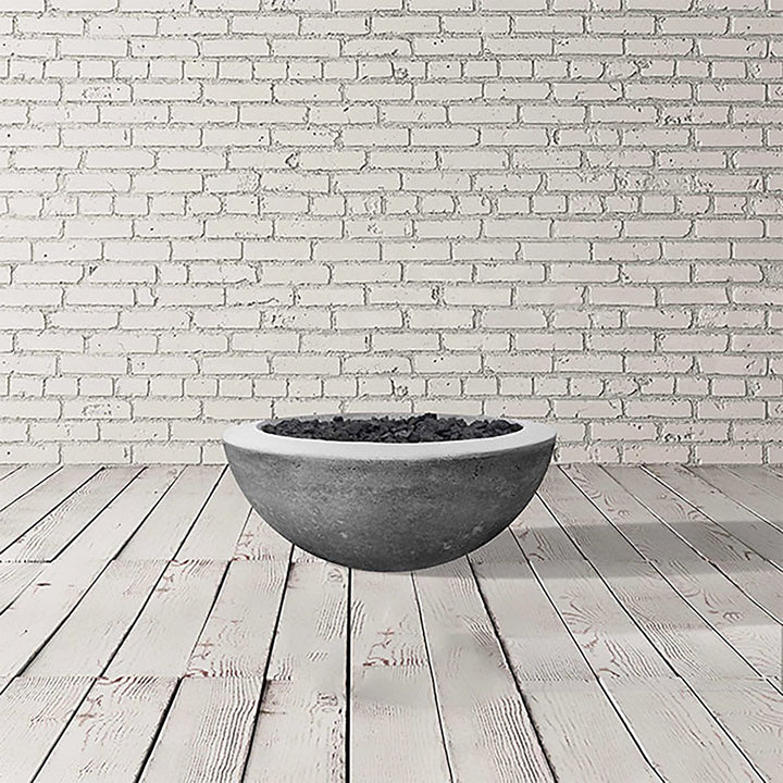 Prism Hardscapes Moderno 2 gas fire pit in elegant pewter, studio shot. This round fire bowl features a contemporary design and a subtle grey hue that fits seamlessly into modern outdoor spaces. Made from durable concrete, this fire pit is designed for natural gas or propane, providing a stylish and functional fire feature for patios, decks, or garden areas.