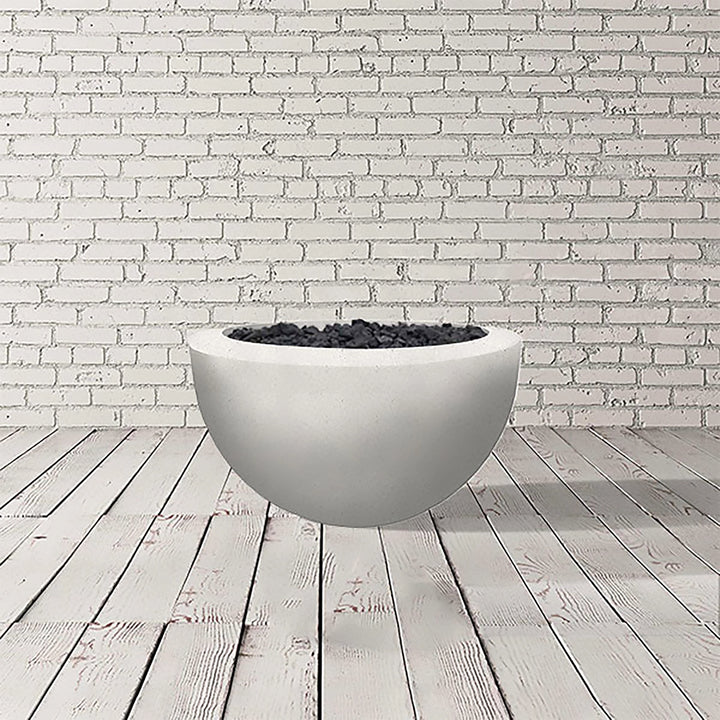 Prism Hardscapes Moderno 3 Gas Fire Bowl in ultra white finish, showcasing a clean and minimalistic round bowl design. This gas fire pit provides a striking contrast to outdoor decor, making it an ideal centerpiece for patios or commercial outdoor spaces. Includes black lava rock for added texture and style. A perfect choice for modern outdoor living. 