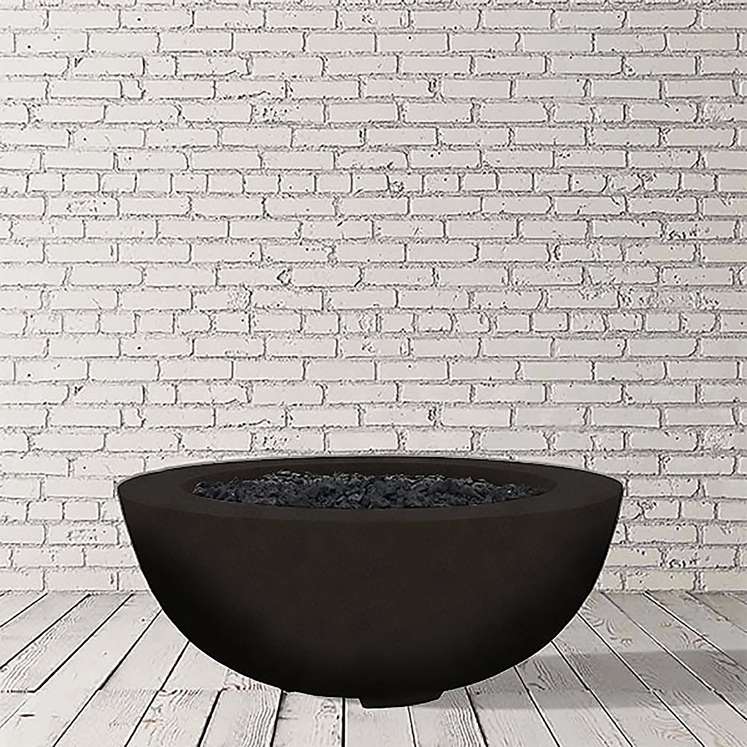 Prism Hardscapes Moderno 8 Gas Fire Bowl in Ebony finish, offering a bold and dark aesthetic with a perfectly rounded shape. This modern outdoor fire pit creates a striking contrast in any backyard or patio space, perfect for natural gas or propane-fueled flames. Enhance your outdoor living area with this sleek gas fire pit.