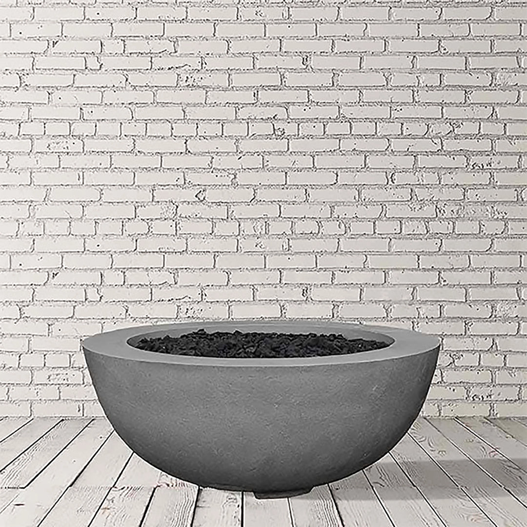  Prism Hardscapes Moderno 8 Gas Fire Bowl in Pewter finish, featuring a sleek, cool gray tone with a sophisticated, rounded design. This outdoor fire pit enhances the modern aesthetic of any backyard or patio space, offering both propane and natural gas options for seamless use. Ideal for a large backyard fire pit or outdoor living area.