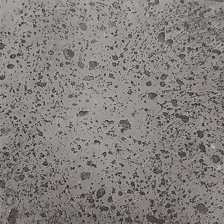 Prism Hardscapes Moderno 4 Gas Fire Bowl swatch in pewter presents a medium-gray concrete finish with dark speckled textures. Ideal for creating a sophisticated, rustic look for modern fire pits, this finish is suited for both commercial and residential settings. Perfect for outdoor fire bowls, modern fire pit tables, and patio fire pits