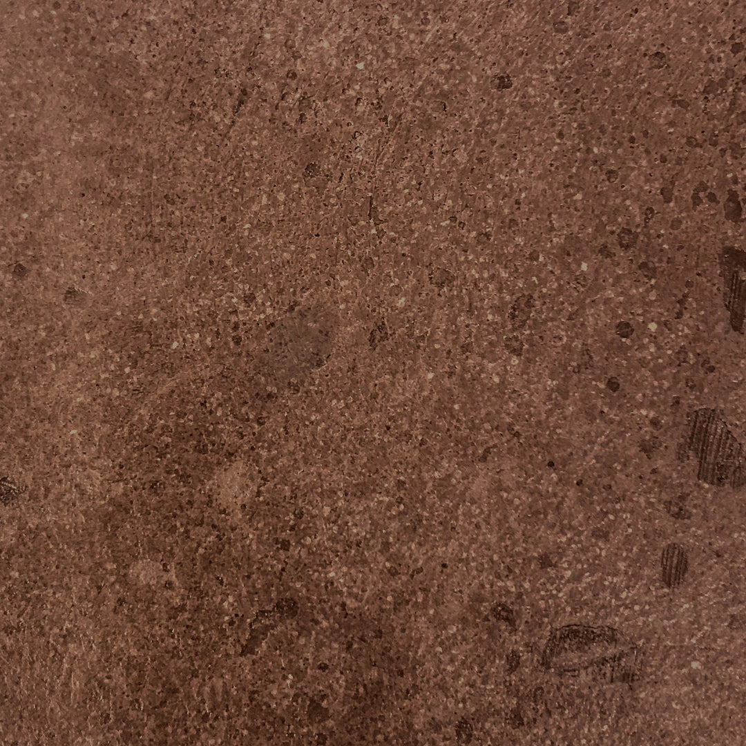 Close-up swatch of the cafe color concrete texture used in the Prism Hardscapes Ovale Gas Fire Pit. The warm, earthy tone of the cafe shade is smooth and complements natural outdoor spaces. Ideal for modern fire pits, backyard fire pits, and outdoor fire tables