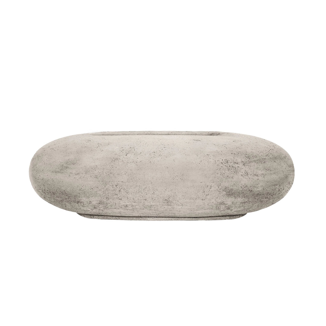  In a natural concrete finish, the Prism Hardscapes Pebble Gas Fire Pit showcases an organic, stone-inspired look. With its sleek oval design, this outdoor gas fire pit blends into any backyard or patio, creating a warm and inviting fire feature.