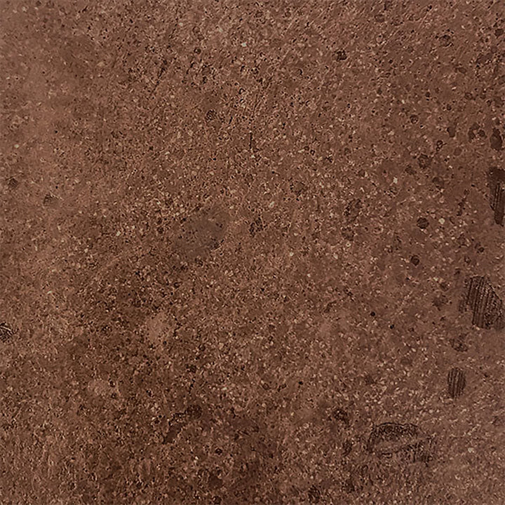 Close-up swatch of the Prism Hardscapes Tavola 1 Gas Fire Pit in a rich, warm cafe color. The surface displays a rustic texture with subtle variations in tone, perfect for complementing modern outdoor fire pits. Ideal for use in a backyard fire pit or patio design featuring large fire pits, adding a natural element to any space