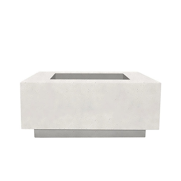 The Prism Hardscapes Tavola 42 Gas Fire Pit in ultra white stands out with its clean, minimalist design. Its crisp white concrete finish offers a striking contrast to outdoor greenery or contemporary furniture, making it a perfect choice for sleek, modern patios. This rectangular fire pit provides warmth and serves as a chic focal point for gatherings