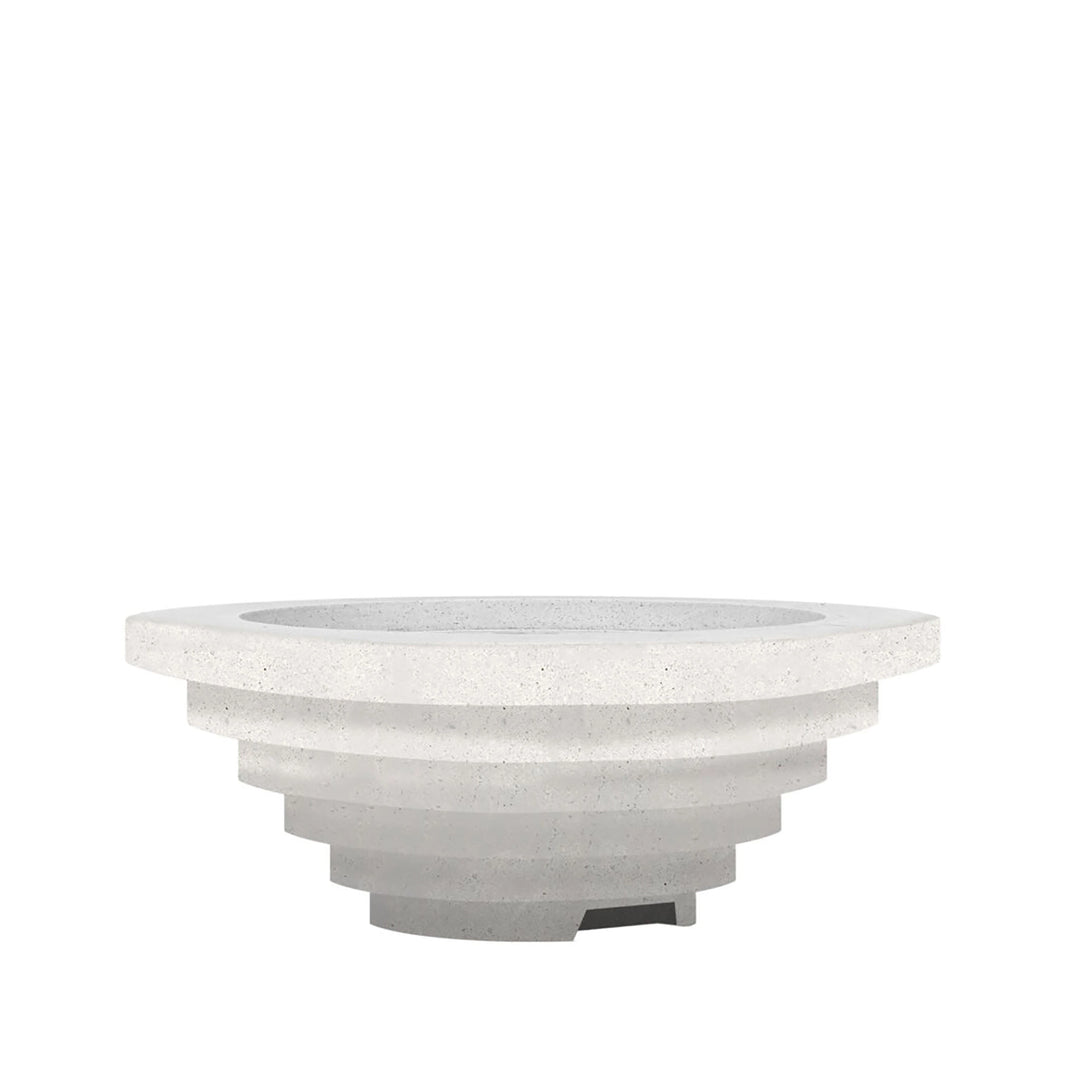 Prism Hardscapes Triton Gas Fire Pit in Ultra White, featuring a crisp, clean concrete finish with a multi-stepped, round design. The bright white tone enhances any minimalist outdoor setting. Built from durable materials, it’s perfect for either natural gas or propane installations.