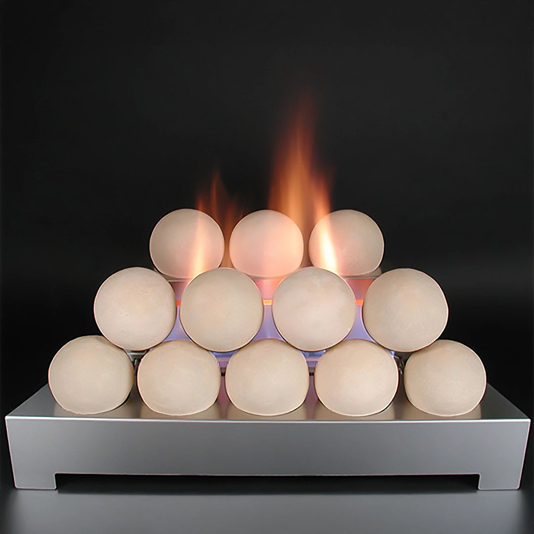 Rasmussen Alterna vent-free fireballs in a soft beige hue, stacked neatly on a contemporary silver stand with a glowing flame backdrop. This setup emphasizes the natural aesthetic of vent-free fireballs, ideal for creating a cozy yet modern ambiance in indoor settings. Designed for energy-efficient, vent-free use, this display combines elegance with practicality for any living space.