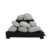 Set of Rasmussen Alterna Vent-Free FireStones in 20-inch light gray, arranged on a black tray. These stones offer a soft, neutral color that complements ventless gas fireplaces, providing a calming and natural look.