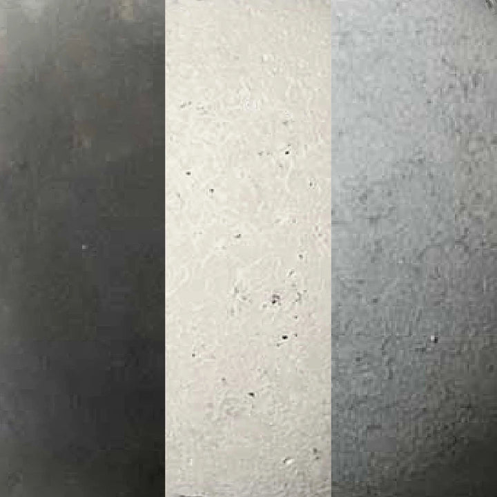 Swatch of Rasmussen Alterna vent-free fire stones in a mixed blend of black, white, and light gray. This multi-color combination offers a unique, authentic stone look, ideal for outdoor fire pits and modern fire features