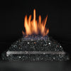 Rasmussen Indoor Alterna Vent-Free FireGlitter Burner set on a sleek metal platform with vibrant flames rising above a bed of clear fire glass. Ideal for enhancing indoor fireplaces with a modern, stylish, and vent-free setup, this burner provides a warm, inviting glow. Perfect for contemporary interior decor, indoor fireplaces, and efficient heating solutions.