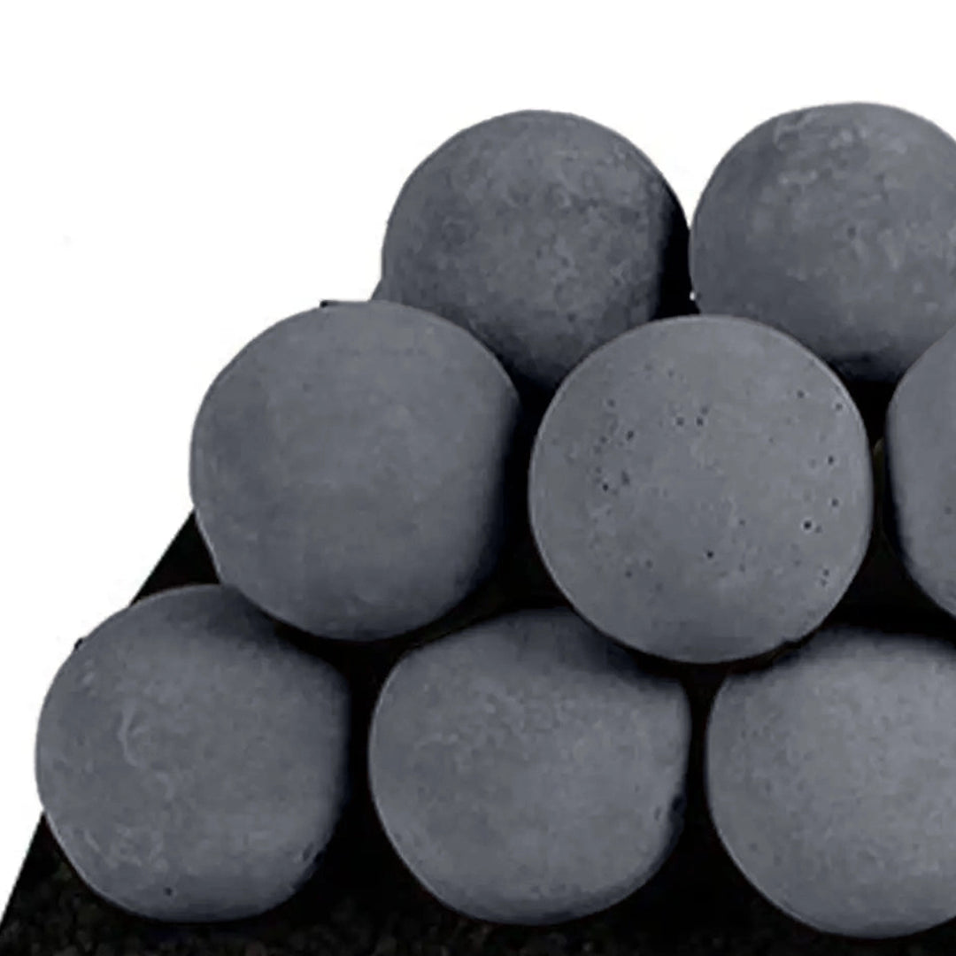 Close-up of the Rasmussen Vented Uniform FireBalls in Dark Grey, showing their perfect round form stacked in a vented fireplace. These dark grey ceramic fireballs create a sleek and contemporary look, offering a stylish alternative to traditional fireplace logs. Built for use in natural gas and propane vented systems, these fireballs are durable and heat-resistant.