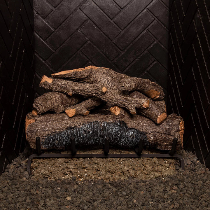 Real Fyre 24-inch Vented American Oak Gas Logs without fire, arranged to showcase detailed bark and wood grain textures. Suitable for vented natural gas fireplaces, adding authenticity to indoor fireplace displays