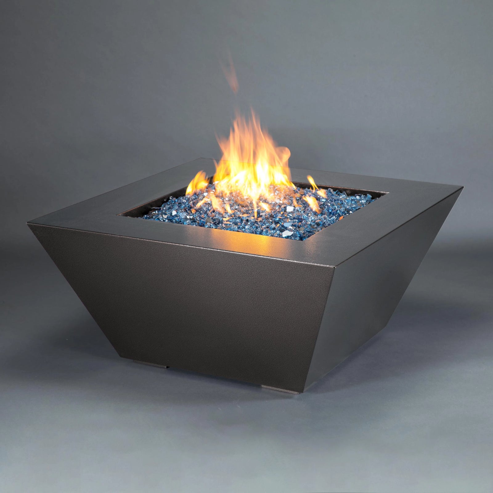 Square modern fire pit with blue fire glass and a vibrant flame, perfect for contemporary outdoor settings