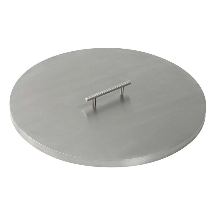 Stainless steel cover for a 25-inch round drop-in fire pit pan by American Fireglass shown in a detailed angled view. This image highlights the flat, smooth surface and the sturdy handle attached to the center, making it easy to lift and place on top of the fire pit pan. The cover's durable stainless steel construction ensures long-lasting performance, providing reliable protection against rain, dust, and outdoor debris. Ideal for homeowners looking to preserve their fire pit's quality and appearance.