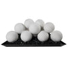 Side view of a set of 12 white 4-inch ceramic fire balls by Starfire Designs, displayed on a tray of black fire glass. These ceramic fireballs are a modern and stylish option for use in gas fire pits, offering a heat-resistant and durable fire media solution. Perfect for outdoor spaces, these white fireballs add a contemporary flair to any fire feature in both residential and commercial settings. White ceramic fireballs, fire pit décor, modern outdoor fire accessory