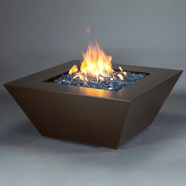 Side view of Starfire Designs Mill 48-inch square steel gas fire pit in Bronze Hammertone, with a robust flame and sleek design, suitable for any backyard or patio setting