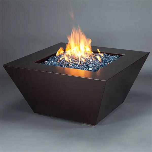 Starfire Designs Mill 48-inch square steel gas fire pit in Copper Vein finish, featuring a vibrant flame and blue fire glass, perfect for enhancing outdoor spaces.