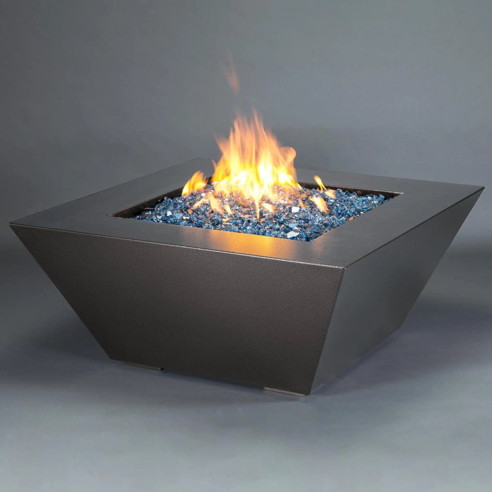 Silver Hammertone Starfire Designs Mill 48-inch square gas fire pit, showcasing a sleek steel body with a blazing flame, ideal for outdoor patios and backyard settings