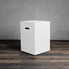 Front view of the Starfire Designs Beton 16-inch White Square Propane Tank Cover, highlighting its sleek, minimalistic design with a clean white finish. The cover features a cutout handle for easy access and is designed to protect and conceal propane tanks in stylish outdoor environments