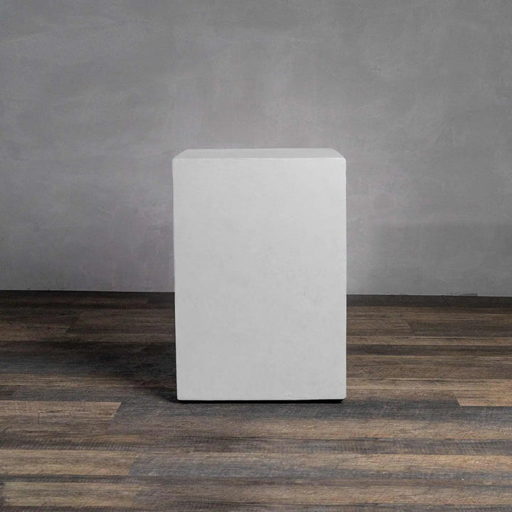 Side view of the Starfire Designs Beton 16-inch White Square Propane Tank Cover, showing the sturdy construction and smooth white surface. This cover is designed to blend effortlessly into contemporary outdoor settings, providing a discreet storage solution for propane tanks