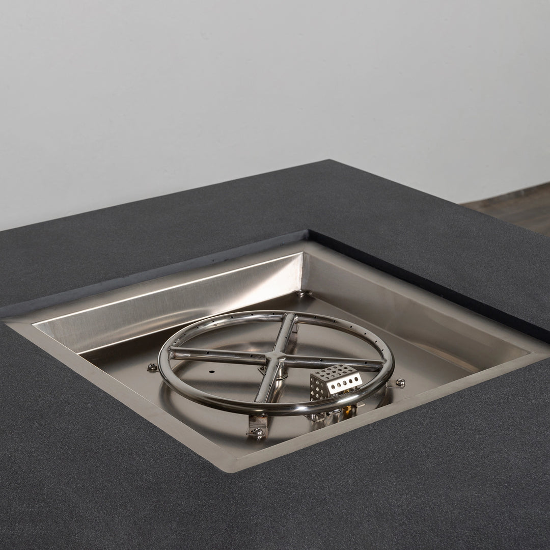 The Starfire Designs 42" Graphite Fire Pit with its protective stainless-steel lid, ensuring durability and protection when not in use. Sleek design integrates into any modern outdoor setup. 