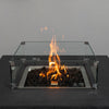 Close-up of the flames inside the Starfire Designs Beton 42" Graphite Fire Pit, with the glass wind guard enhancing safety and style. The perfect addition to outdoor spaces.