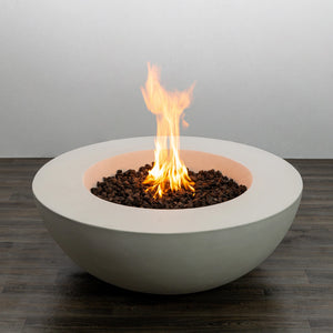 Starfire Designs Beton 42 Inch White Round Concrete Gas Fire Pit lit with flames, showing its recessed design and decorative black lava rocks, perfect for enhancing outdoor decor.