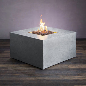 Starfire Designs Beton 42" Natural Gray Square Gas Fire Pit featuring a clean, minimalistic design in concrete. The natural gas fire pit is equipped with a hidden propane tank storage, keeping the gas tank out of sight. Lava rocks are placed around the powerful burner, providing an elegant fire display. Perfect for outdoor patios, this modern fire pit offers a contemporary square shape with a seamless finish.