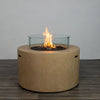 The Starfire Designs Beton 42" Sand Round Concrete Gas Fire Pit with a glass wind guard and active flame. The sand finish enhances the sleek and stylish design, creating a warm centerpiece for outdoor gatherings. 