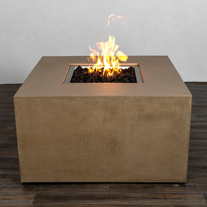 Side view of the Starfire Designs Beton 42-inch sand square hidden propane tank gas fire pit. Highlights include a durable concrete finish, ergonomic handles for mobility, and a modern minimalist outdoor fire pit style.