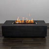 The Starfire Designs Beton 55" Graphite Rectangle Gas Fire Pit fully lit with vibrant, dancing flames, creating a cozy and contemporary ambiance for any backyard or patio setting.