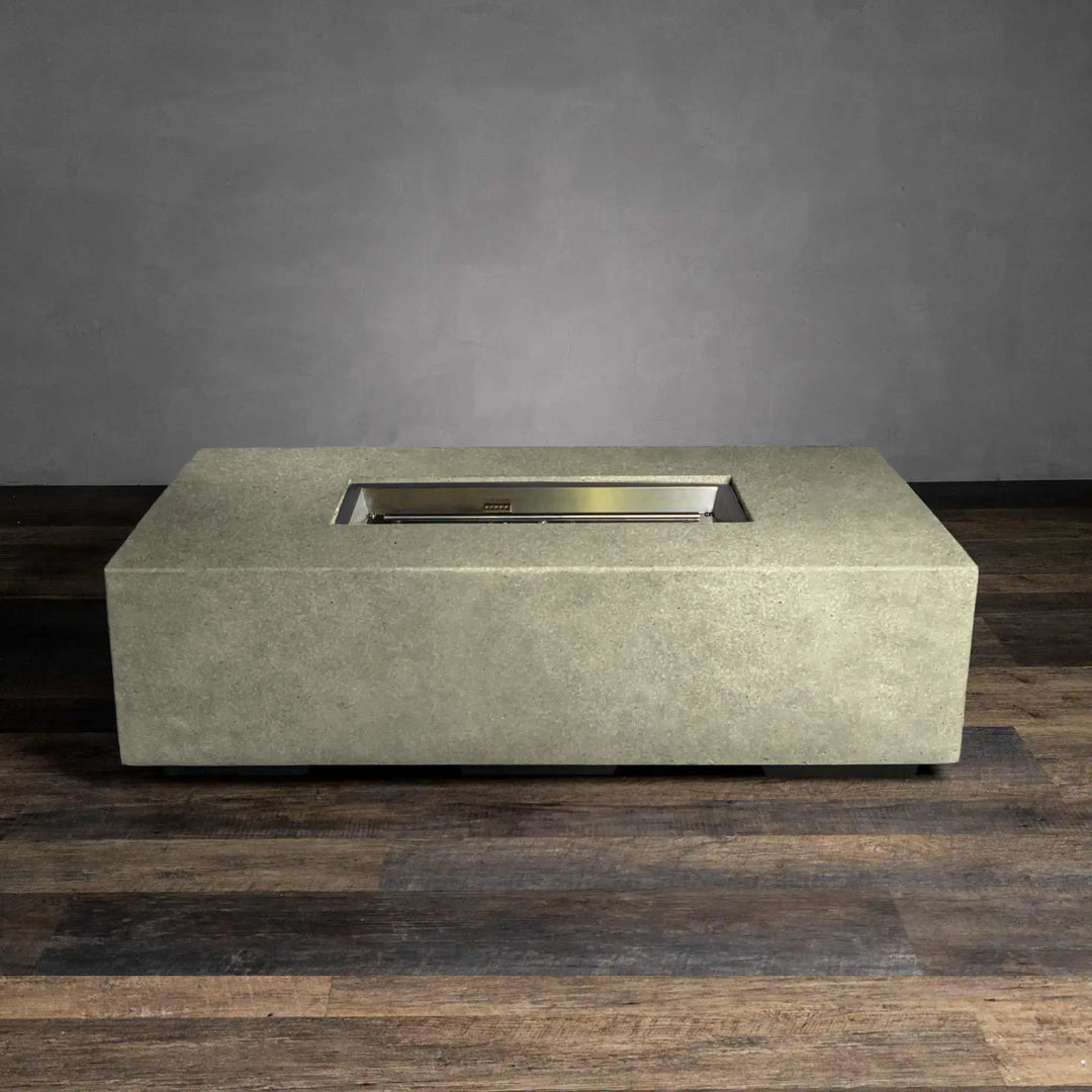 Front view of Starfire Designs Beton 55-inch rectangle gas fire pit in sand finish, showcasing sleek concrete design ideal for outdoor luxury settings