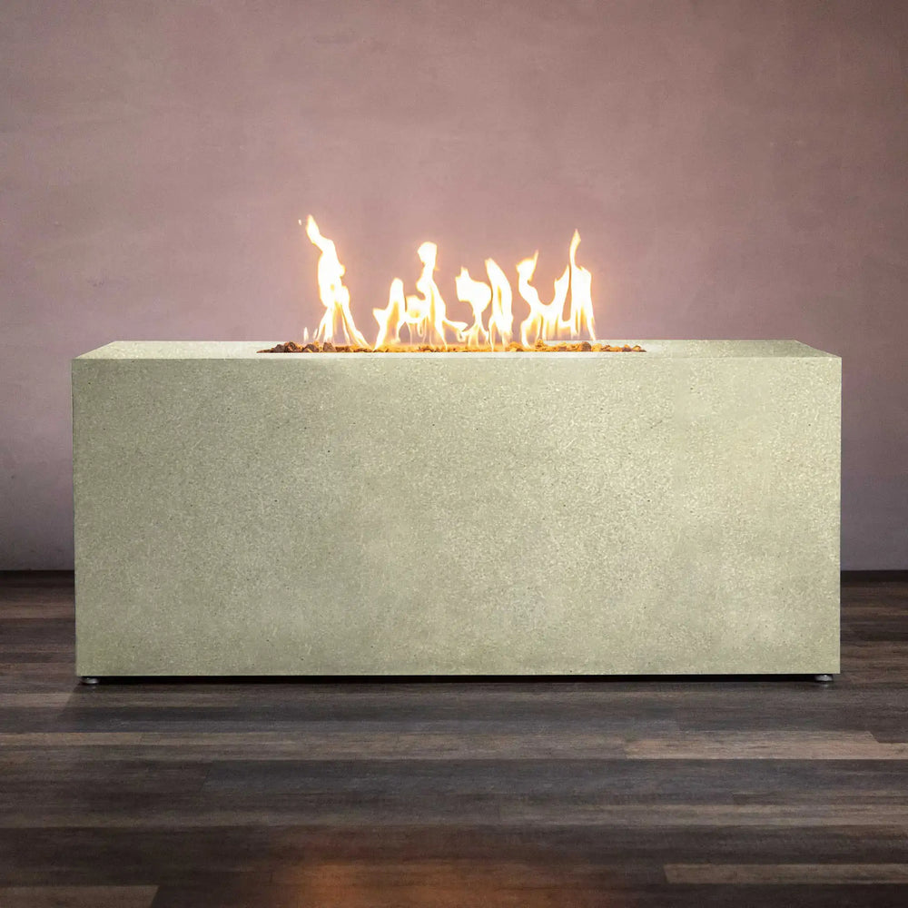 Full view of the Starfire Designs Beton 55-inch rectangle hidden propane tank fire pit in sand finish, providing a comprehensive look at its modern design and functional elements