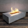 Rectangle Gas Fire Pit showcases a sleek, modern design with clean lines. Made from durable natural gray concrete, this gas fire pit features a rectangular opening filled with black lava rocks and vibrant flames, making it perfect for outdoor entertainment. Ideal for patios and outdoor spaces, it provides a contemporary aesthetic with a powerful heat output.