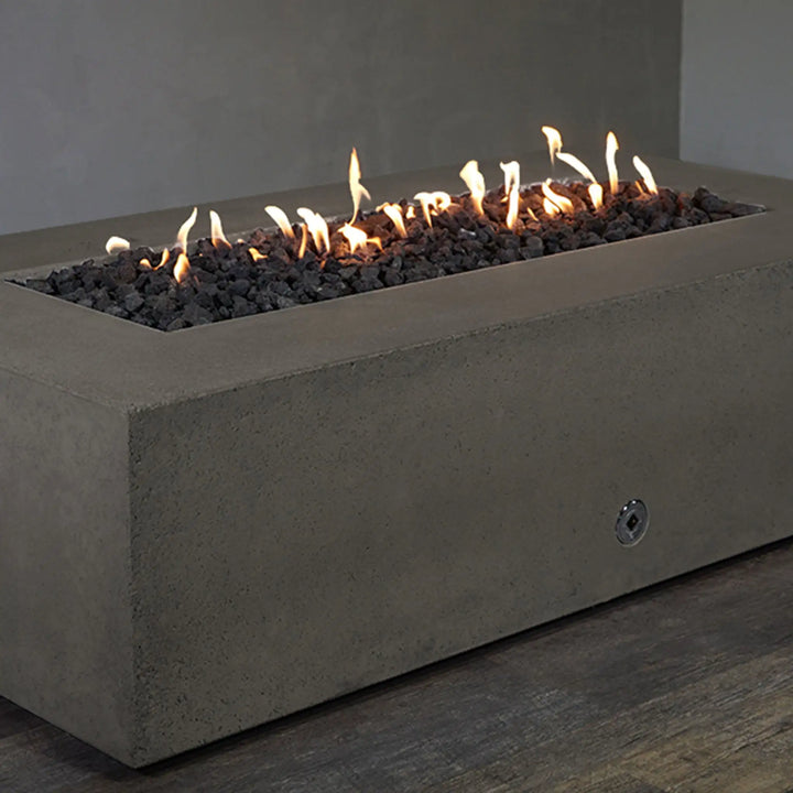 Starfire Designs Concrete Rustic 72-inch x 38-inch Rectangle Gravity Gas Fire Pit in Brown, angled view with lava rocks, showcasing the concrete texture and functional design, perfect for outdoor living spaces