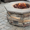 Lifestyle image showcasing the Starfire Designs Mason Venting Panel in use within an outdoor stone fire pit setup. The panel provides essential ventilation for natural gas fire pits, while its modern design complements the overall aesthetic of the fire pit, making it an ideal addition to any backyard fire pit installation