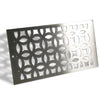 Angled view of Starfire Designs Decorative Fire Pit Venting Panel - Trellis, displaying the detailed lattice design made from durable stainless steel, ideal for modern outdoor fire pits needing both ventilation and aesthetic appeal