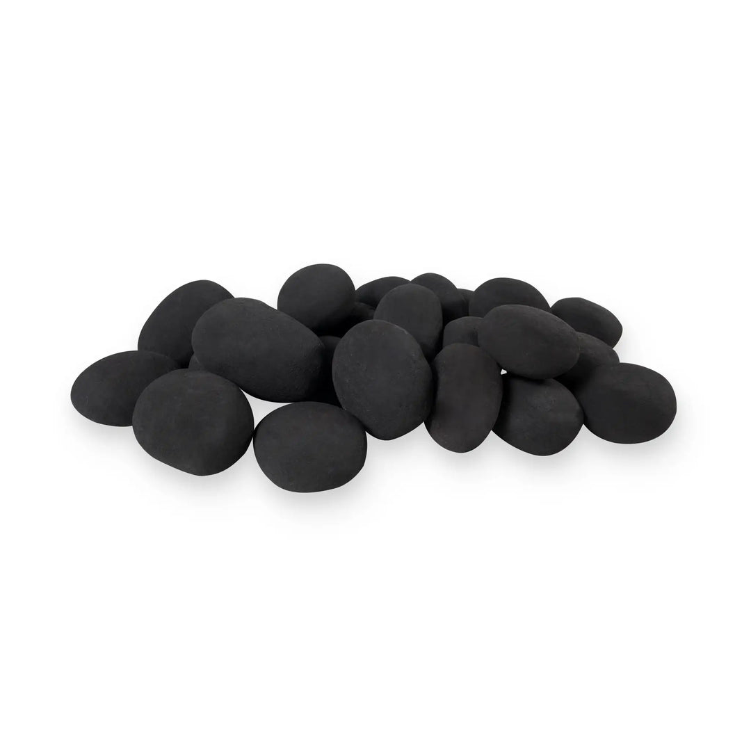 Close-up view of the Starfire Designs Fire Pebbles 24-piece set in black, arranged in a layered fashion. The smooth pebbles are showcased on a bed of black fire glass, offering a minimalist and sophisticated look for fire pits. Ideal for creating a polished, contemporary atmosphere.